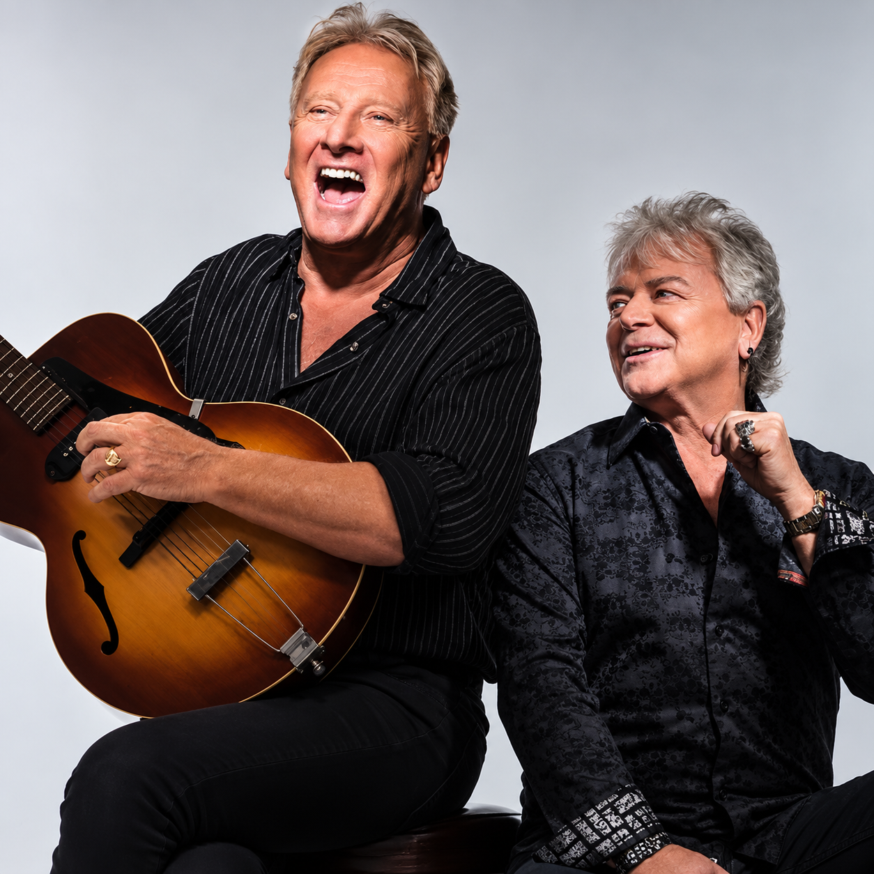 Joyful Guitar Duo Studio Portrait