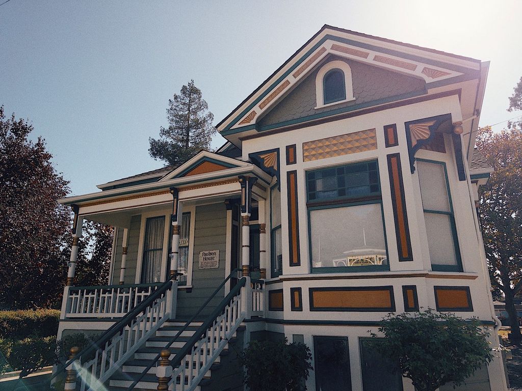 Paulson House Victorian with gold and green trim at History Park San Jose
