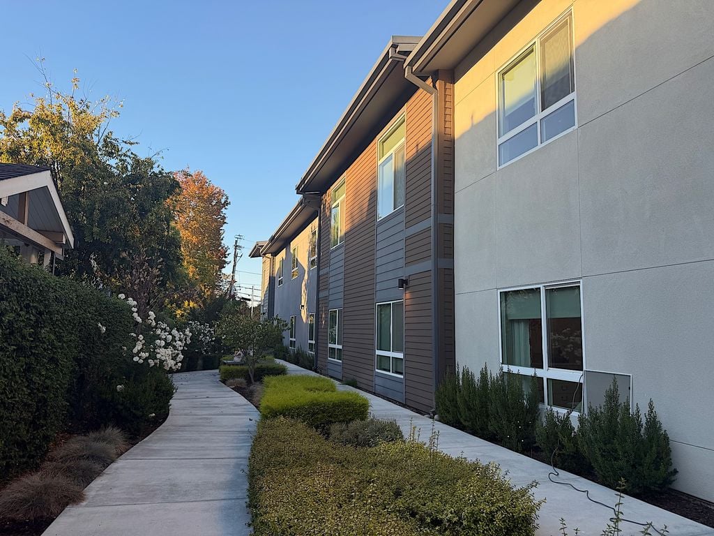 Landscaped garden walking path beside Ivy Park at San Tomas in San Jose