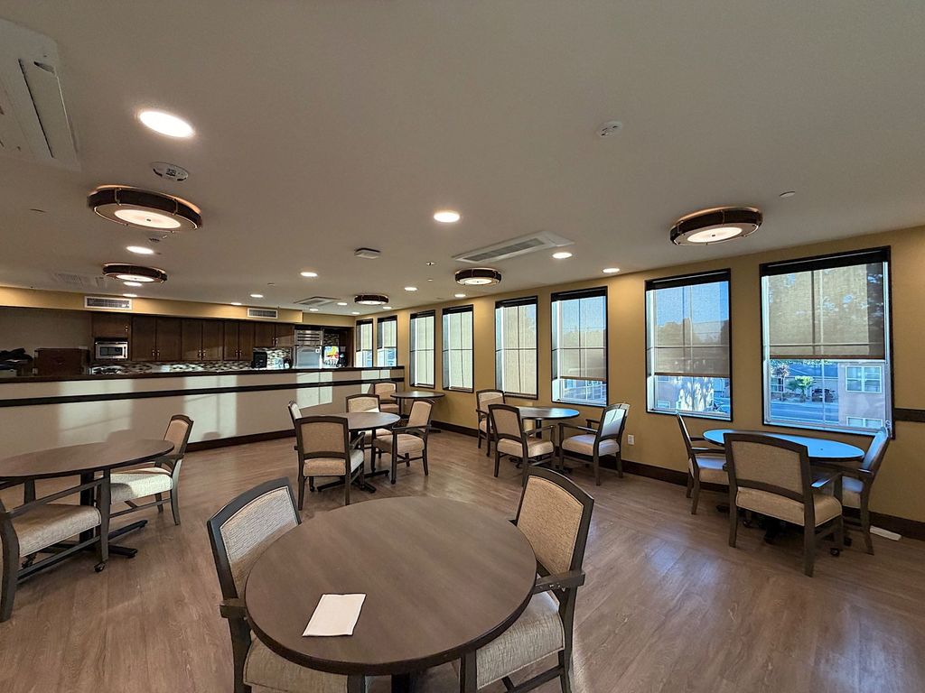 Dining room and serving kitchen at Villa Toscana Memory Care in Mountain View