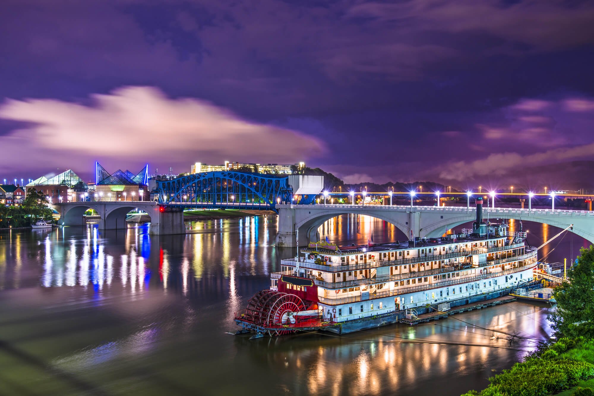 night riverboat cityscape