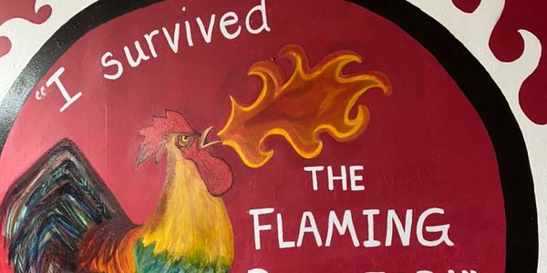 🔥 Discover Chattanooga’s Hottest Spot: The Flaming Rooster
