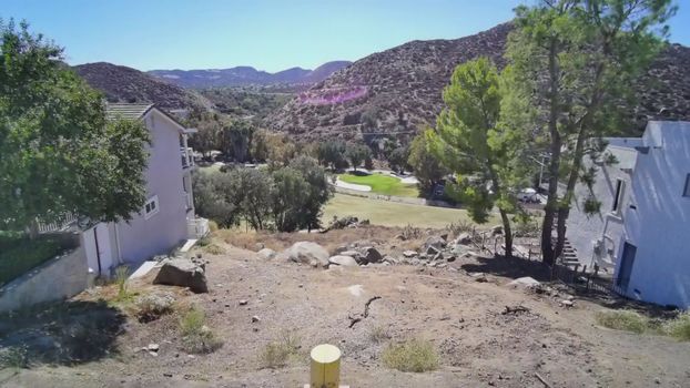 30789 Early Round Drive, Canyon Lake CA - aerial view of the lot from the north with the hillside beyond