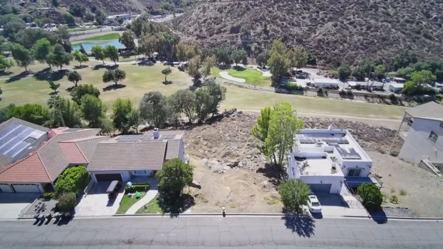 30789 Early Round Drive, Canyon Lake CA - aerial view of the parcel and the fairway beyond