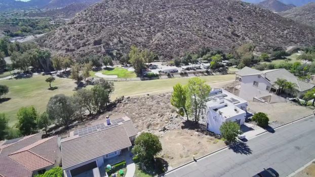 30789 Early Round Drive, Canyon Lake CA - aerial view across the lot toward the course and clubhouse