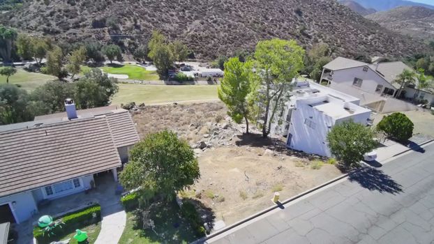 30789 Early Round Drive, Canyon Lake CA - aerial view of the lot from above the neighboring rooftop