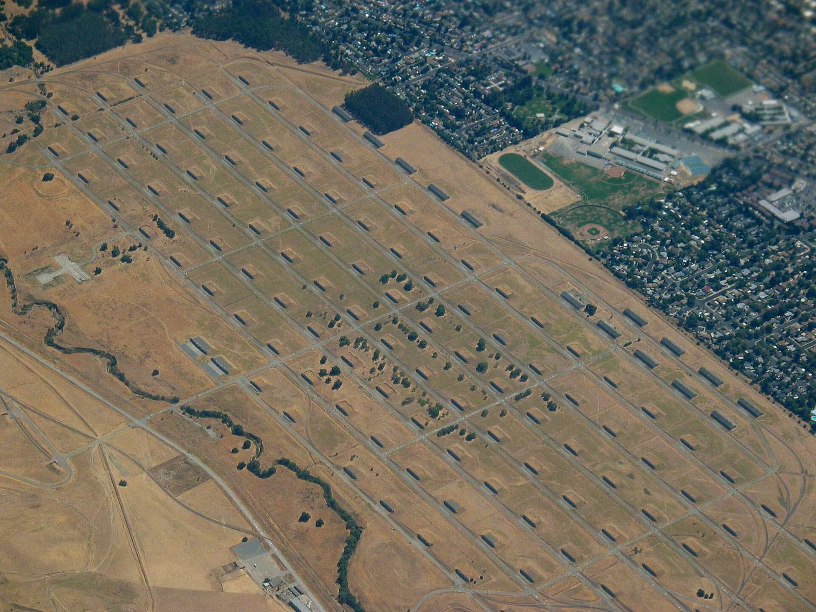 Aerial view of the former Concord Naval Weapons Station bunker grid next to existing Concord neighborhoods, 2006