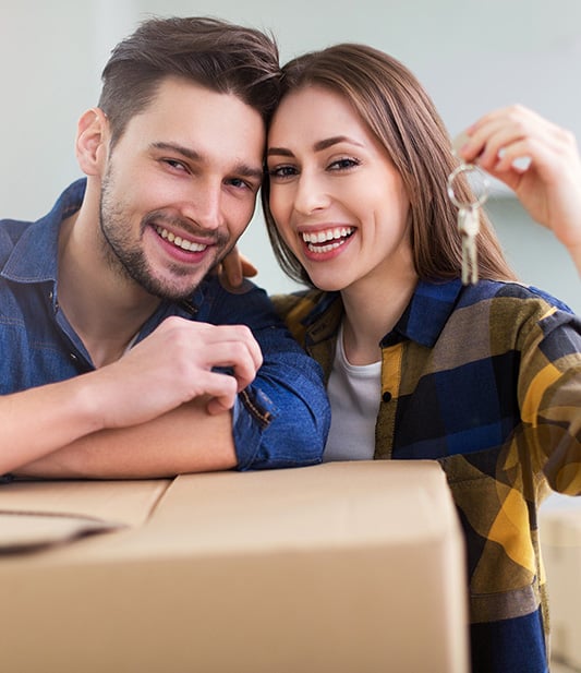 Couple,Showing,Keys,To,New,Home