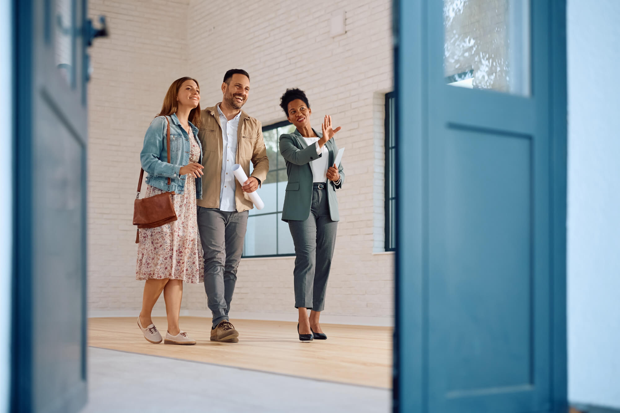 couple home tour realtor