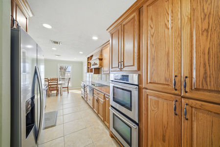Galley kitchen in the primary living area of 2365 S. FM 46 in Franklin, TX