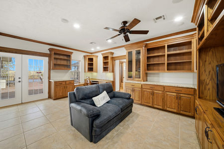View of the open concept secondary living area with lots of built ins in 2365 S. FM 46 in Franklin, TX