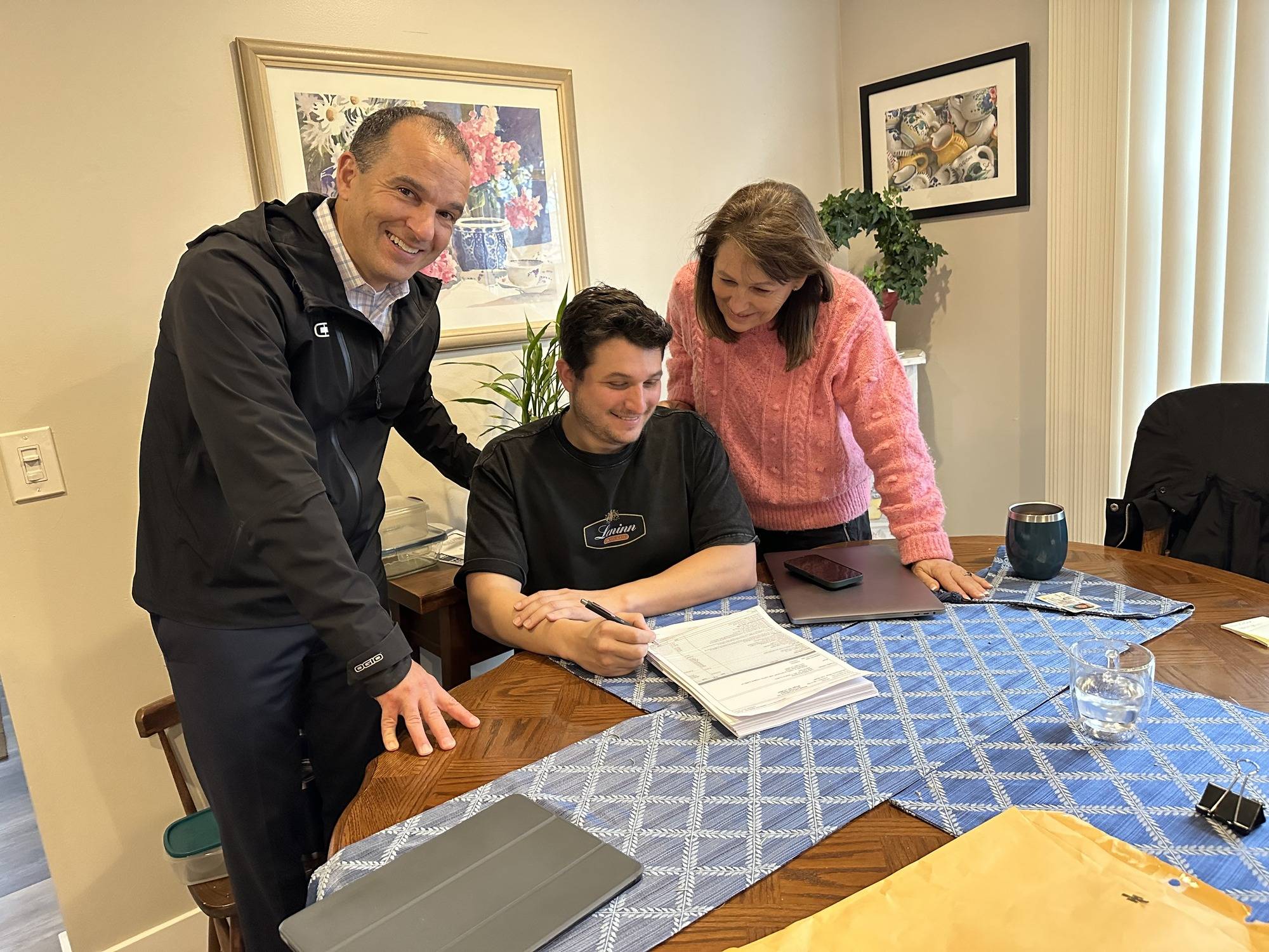 family signing document