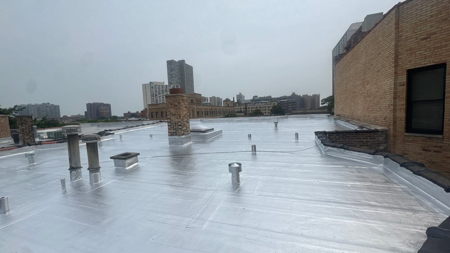 Completed multifamily flat roof replacement at 3820 North Fremont Street in Chicago