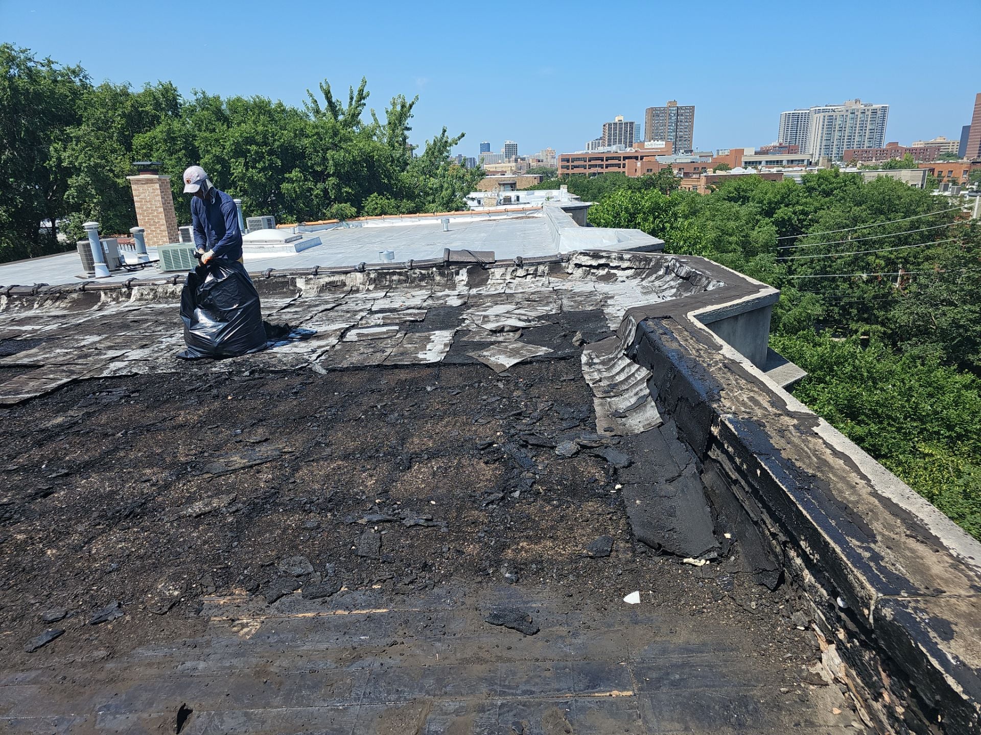 Beginning of the flat roof tear-off process
