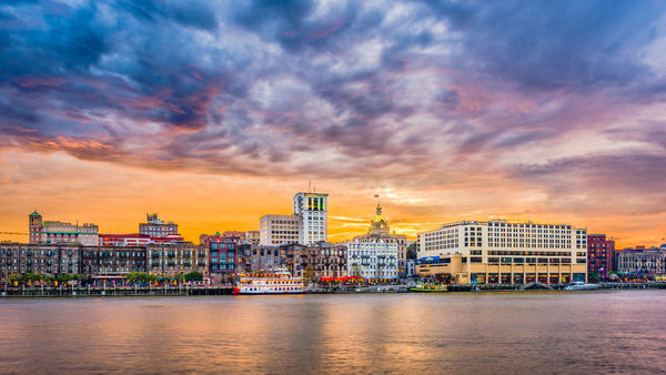 Savannah, Georgia, USA skyline on the Savannah River at dusk