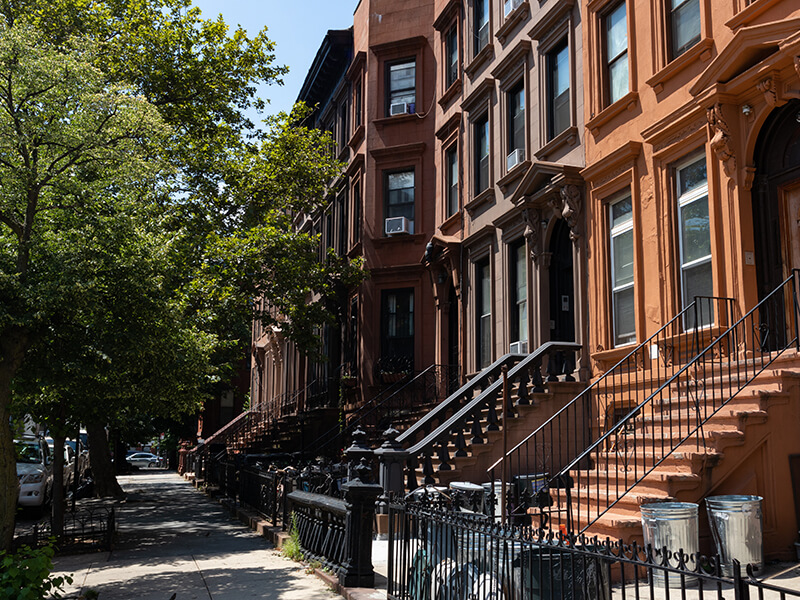 Row-of-Old-Brownstone-Homes-in-Bedford-Stuyvesant-in-Brooklyn-of-New-York-City-small