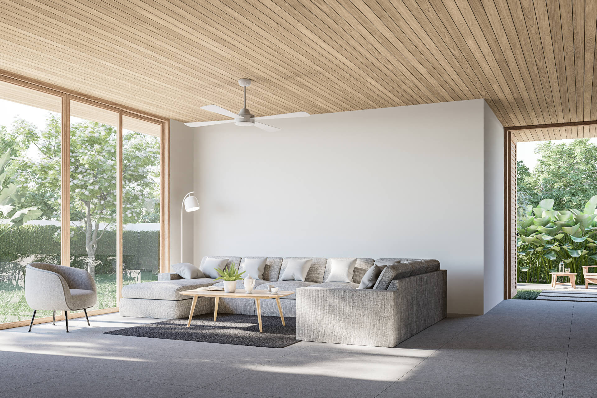 Modern contemporary loft living room with open door to garden