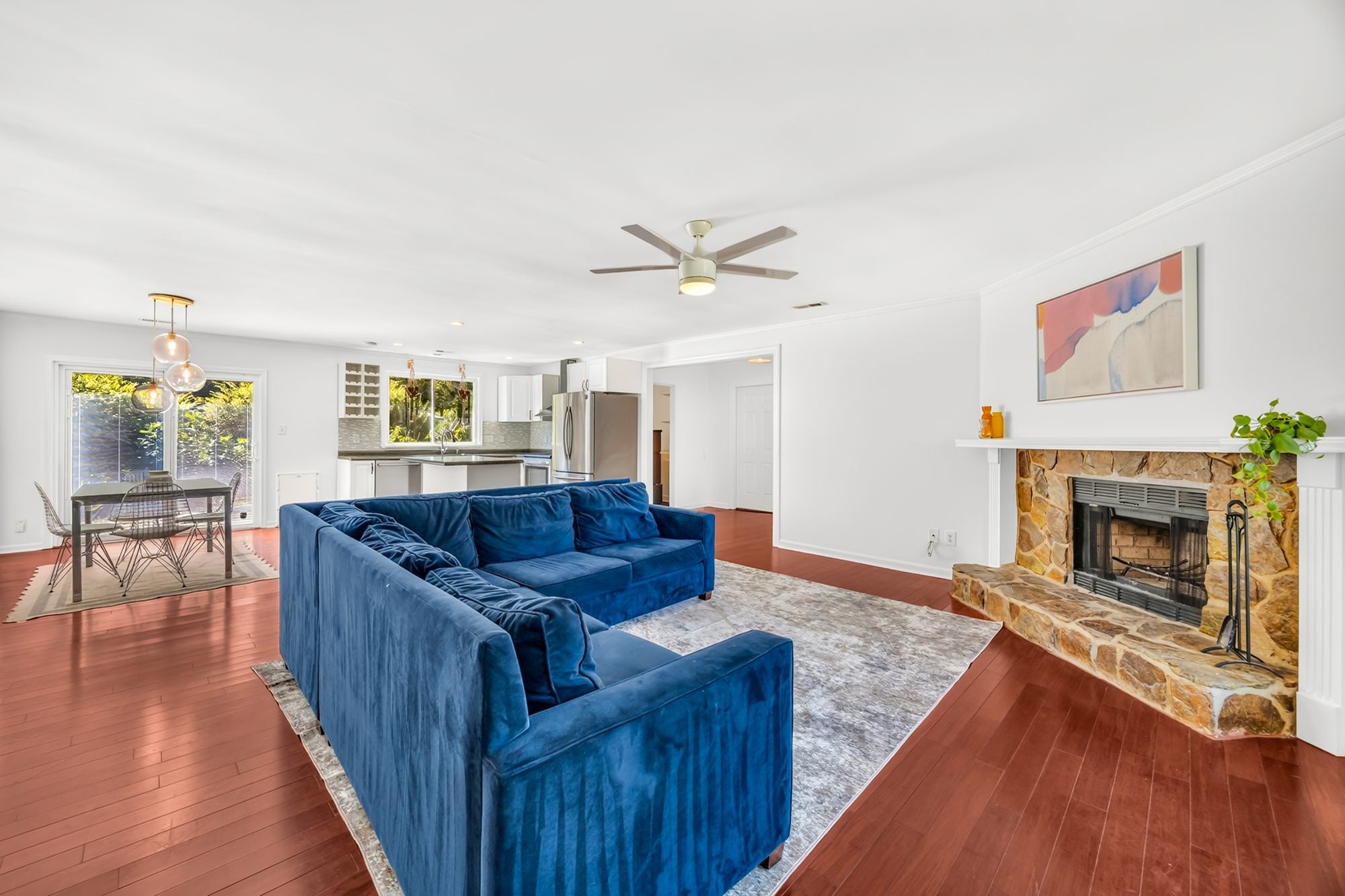 Family room open to the dining area at 4900 Cricklewood Lane