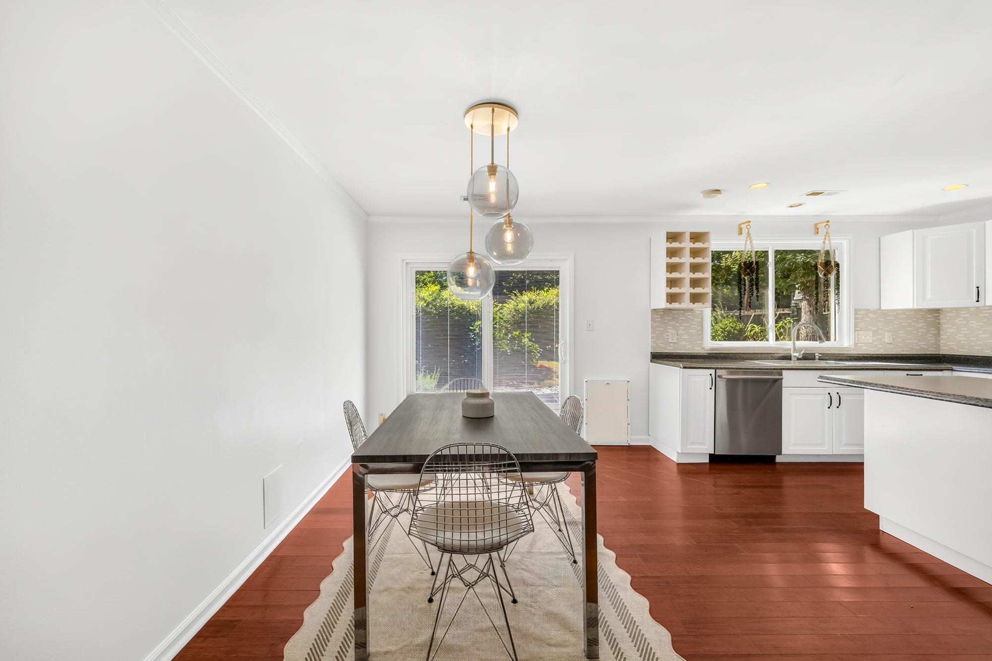 Dining area open to the kitchen at 4900 Cricklewood Lane