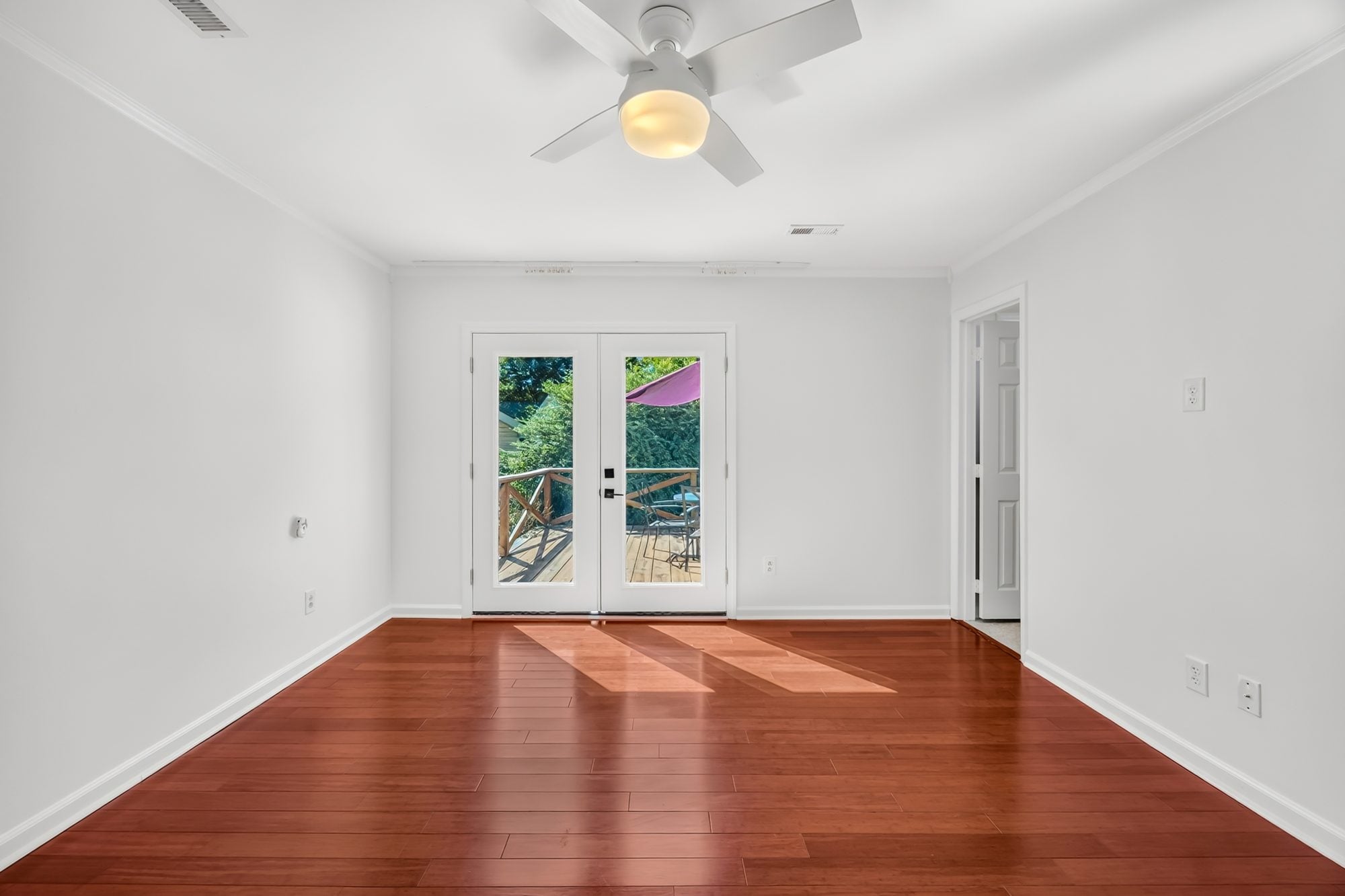 Bedroom with French doors at 4900 Cricklewood Lane