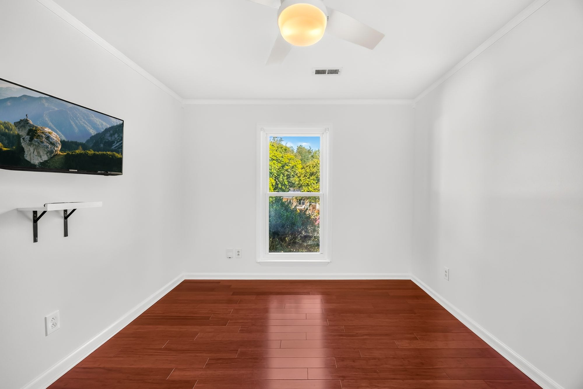 Bedroom with ceiling fan at 4900 Cricklewood Lane