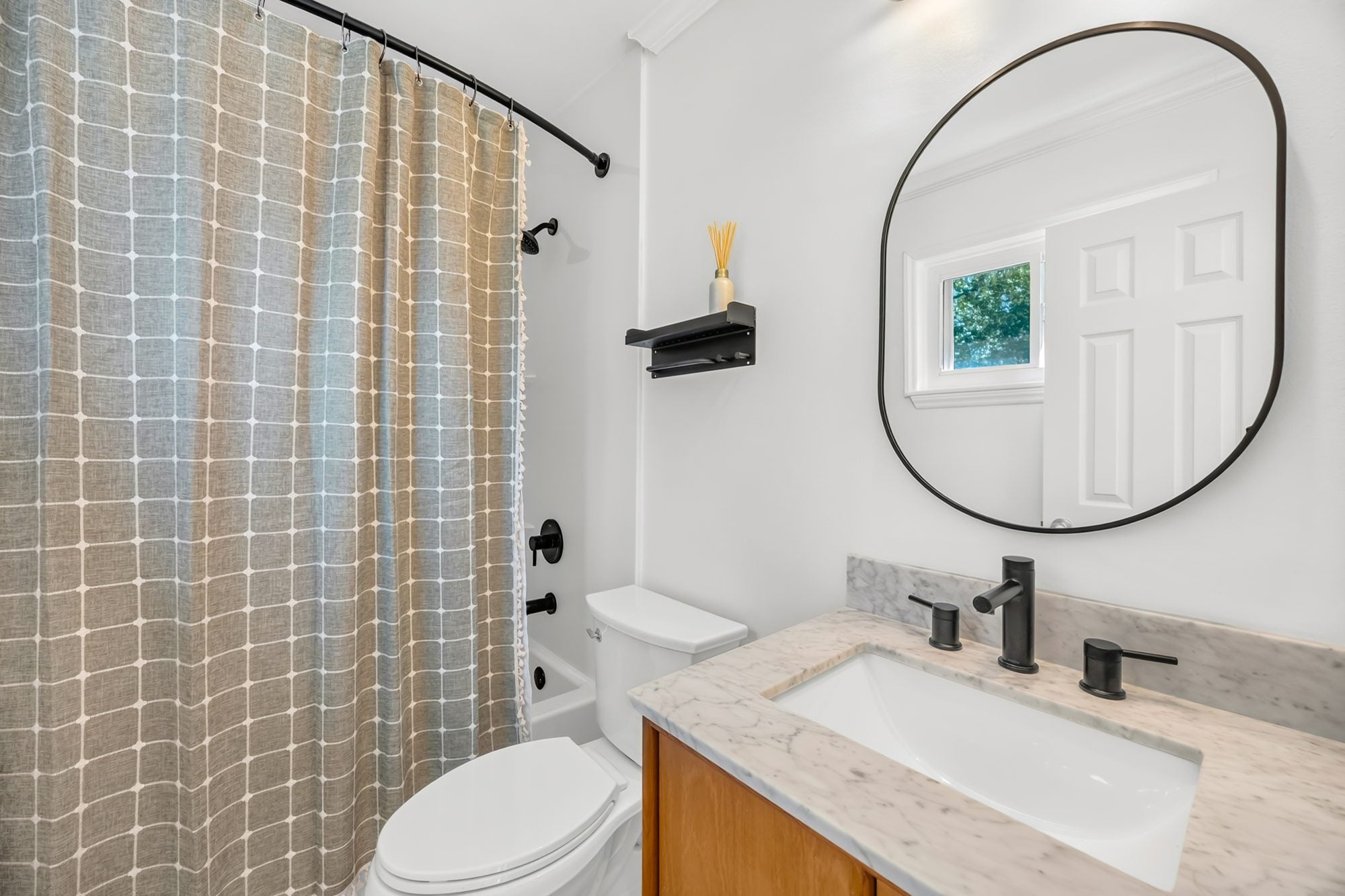 Bathroom with tub and shower at 4900 Cricklewood Lane