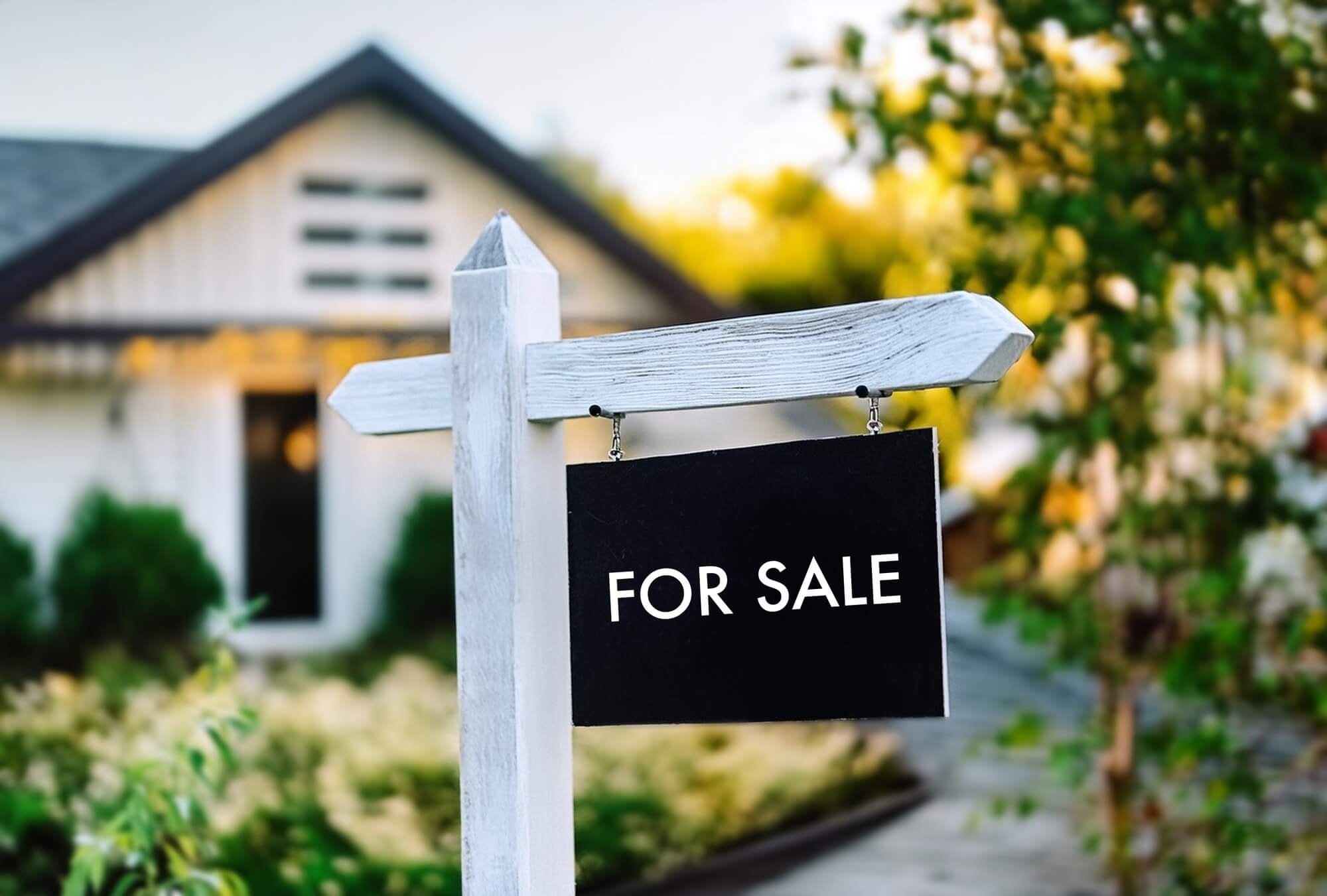 realestate sign infront of a house