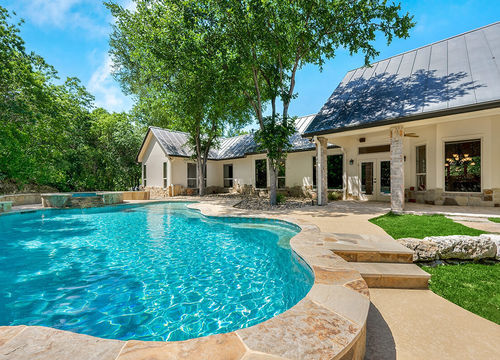 A-home-back-yard-with-a-swimming-pool
