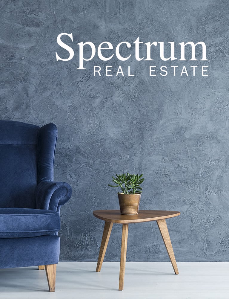 Interior,With,Grey,Wall,Blue,Armchair,And,Wood,Side,Table