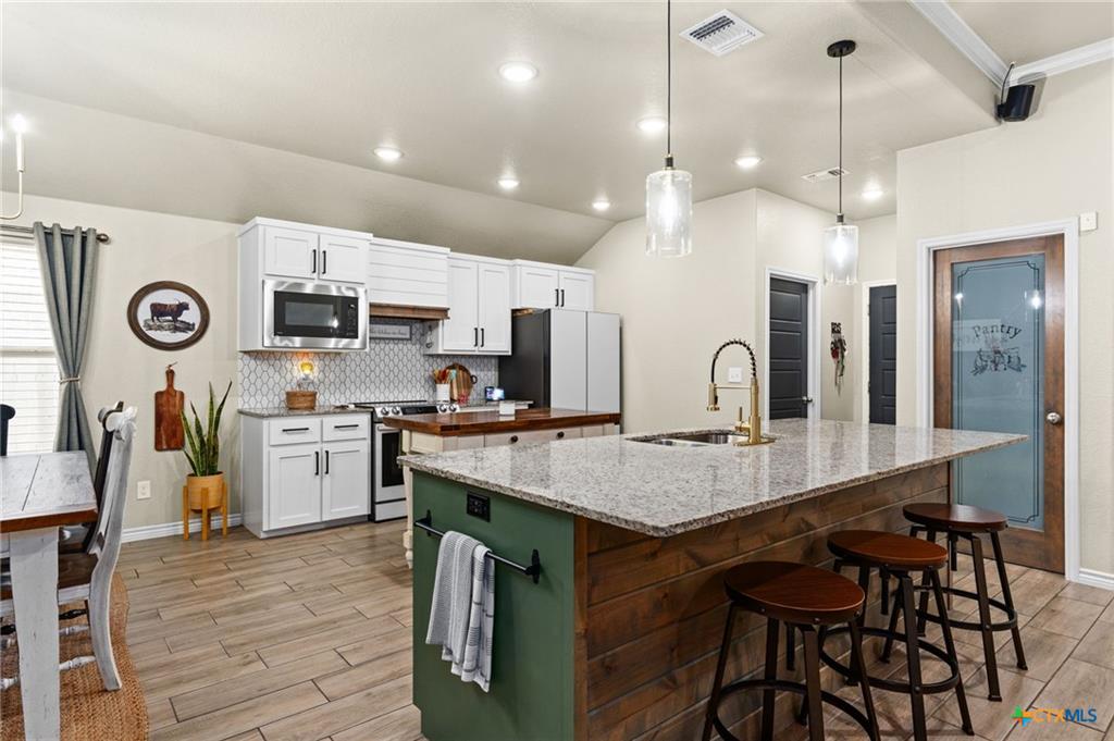 Bella Terra kitchen interior — premium Carothers construction with modern finishes