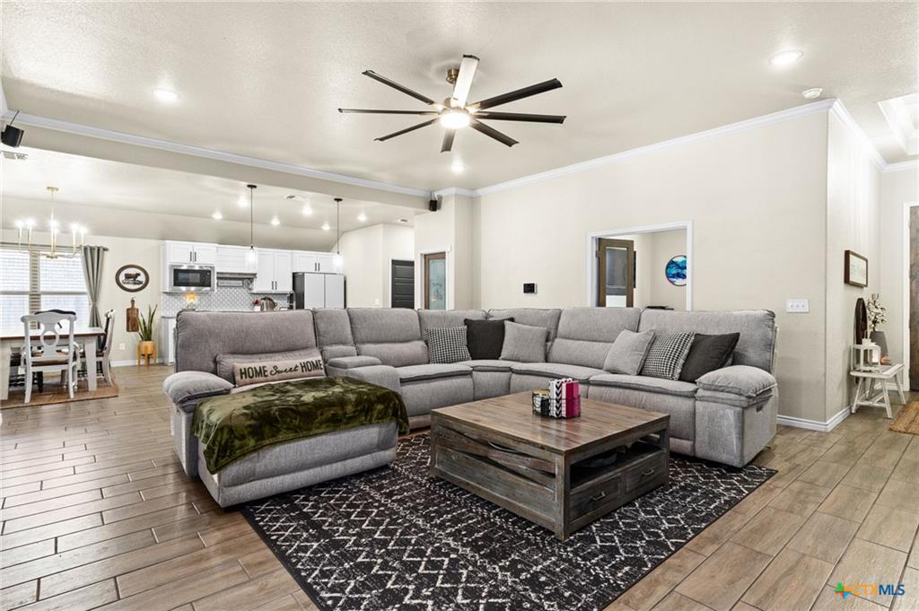 Open-concept living room in Bella Terra home — premium finishes and natural light