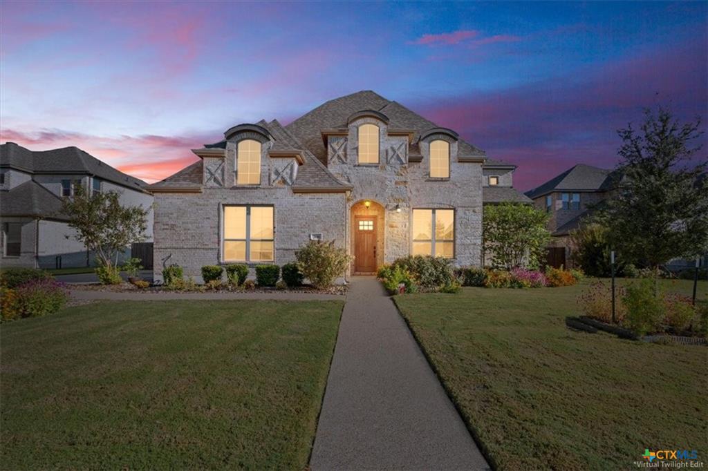 Legacy Ranch luxury home at twilight — contact Taylor Dasch for Legacy Ranch homes