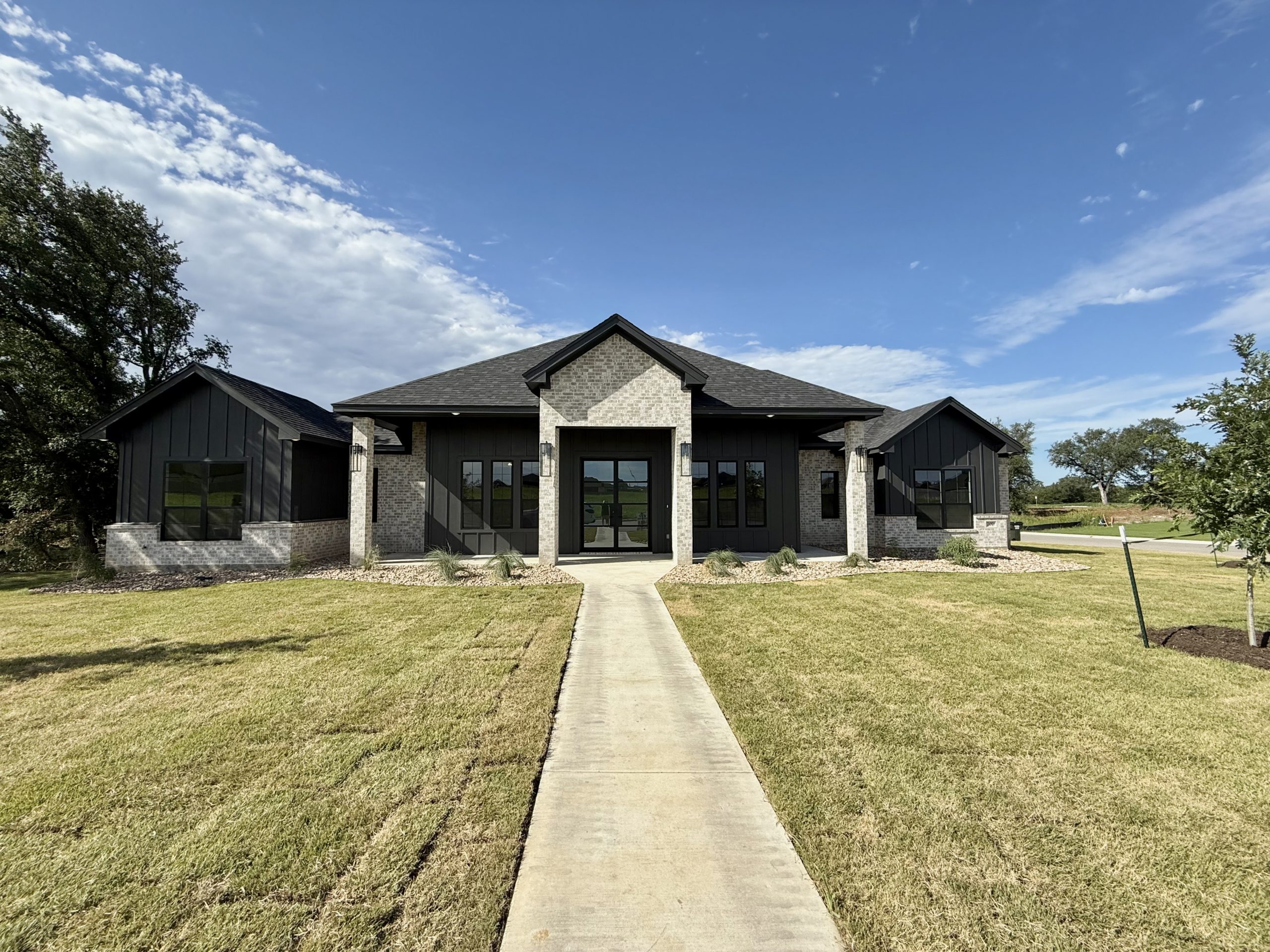 Carothers home exterior with masonry facade in Temple TX