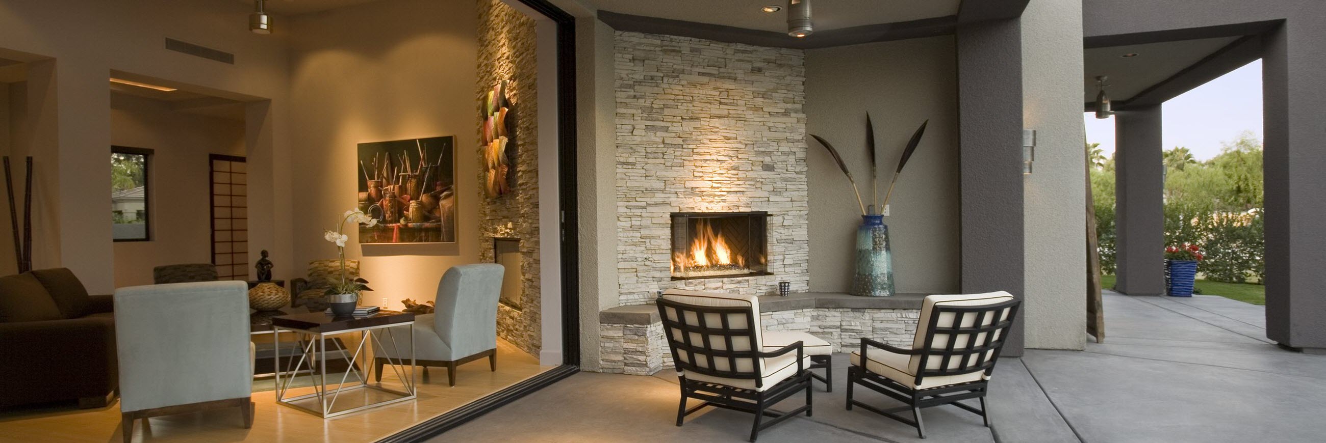 Eagle Ridge Builders rear elevation with outdoor living and covered patio