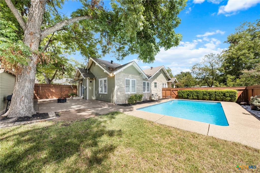 Backyard with pool at a historic home in the North Central Temple Historic District