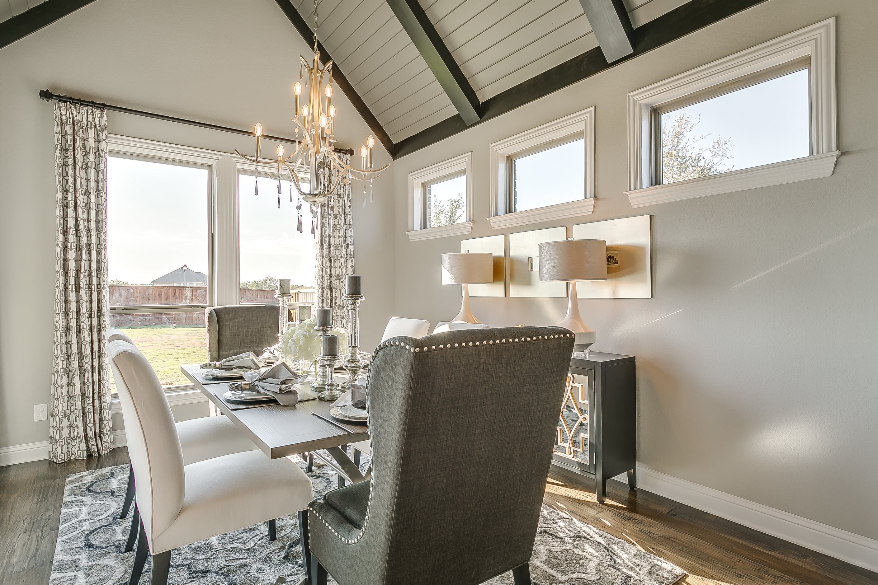 John Houston formal dining area with upgraded lighting