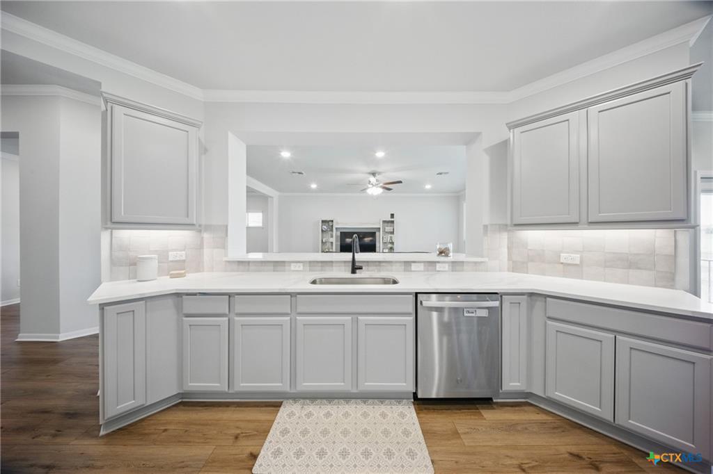 Omega Builders standard kitchen with solid surface countertops