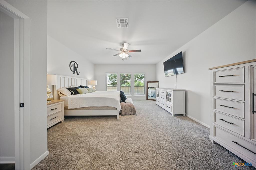 Omega Builders primary bedroom suite