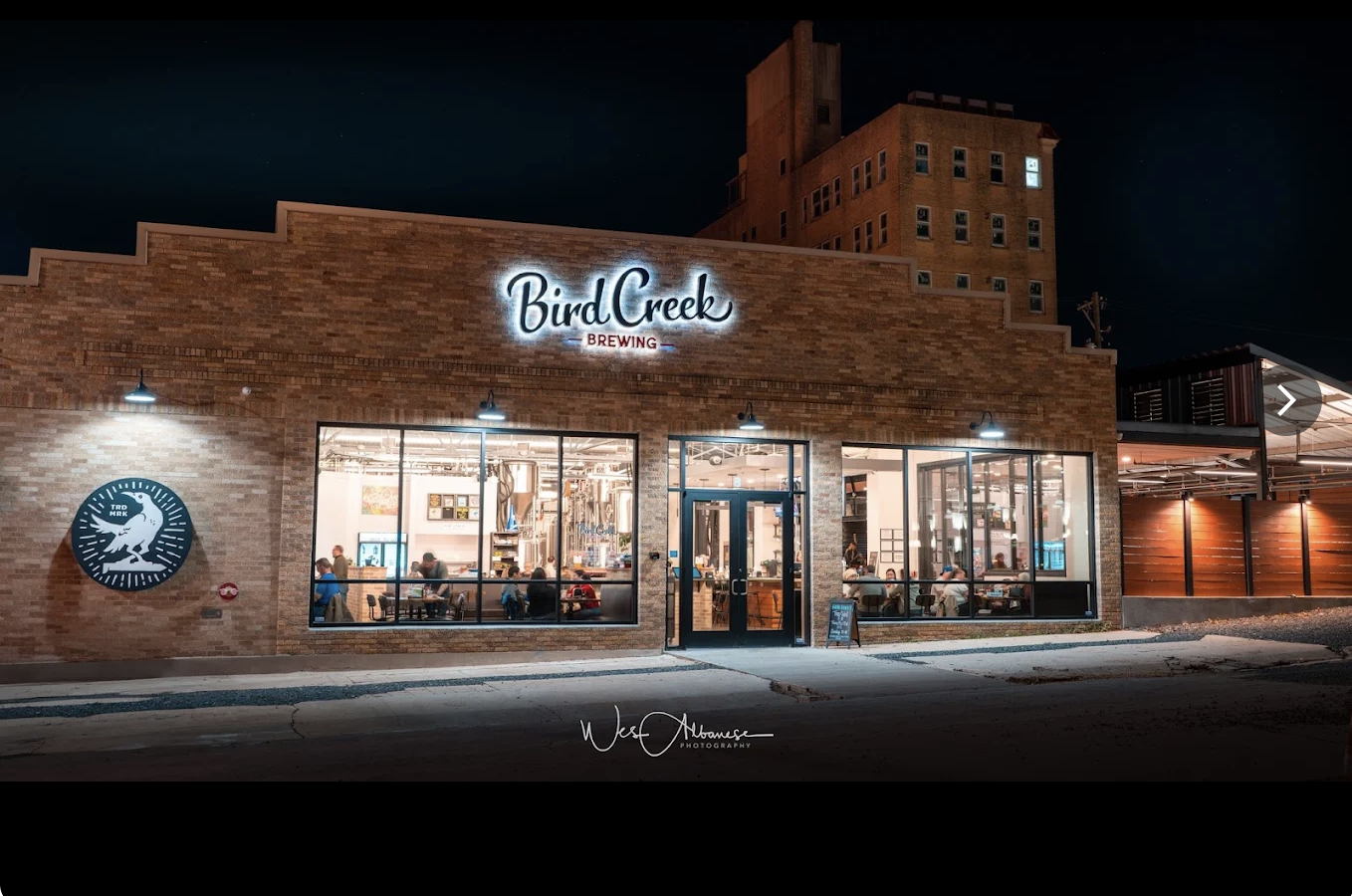 Bird Creek Burger Co exterior at twilight in downtown Temple TX