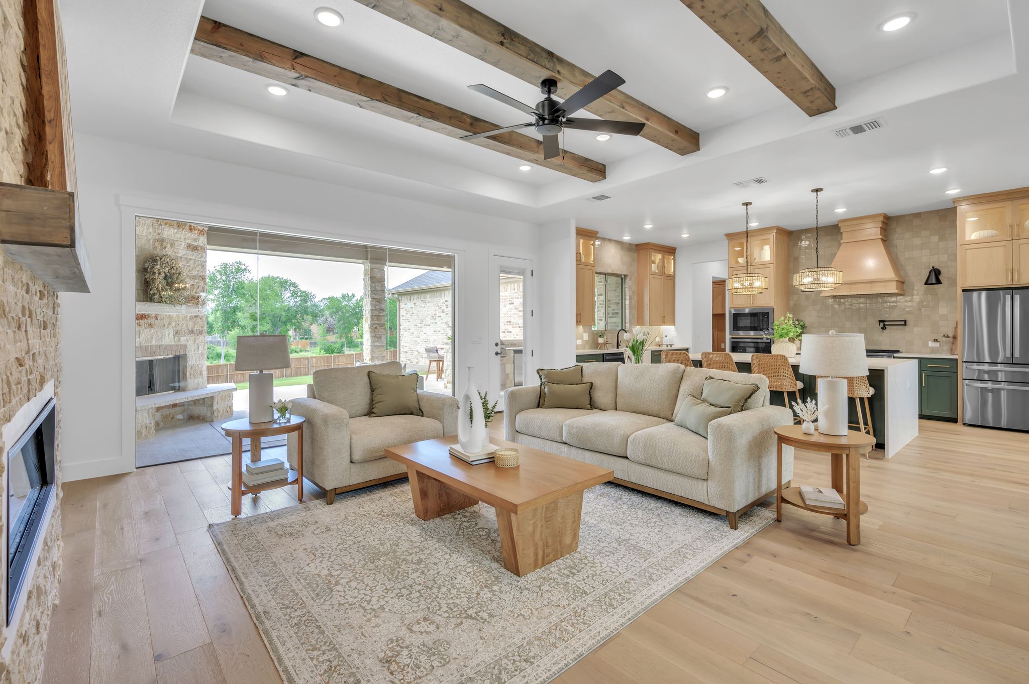 Carothers open concept living room with hard surface flooring