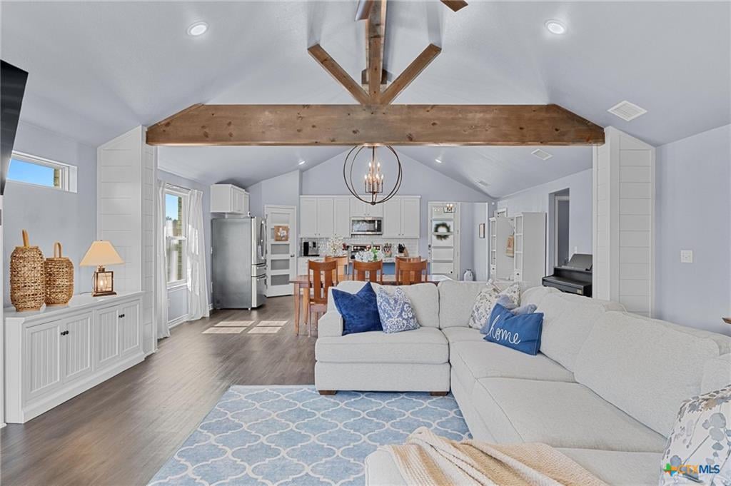 Flintrock Builders open living area with beamed ceiling