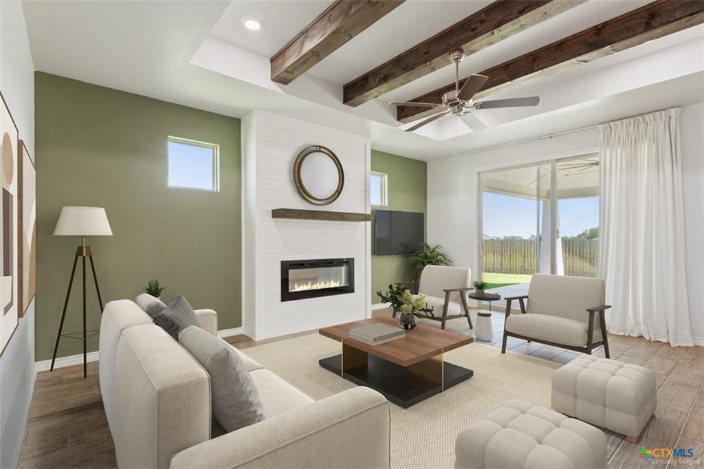 Flintrock Builders living room with beamed ceiling detail