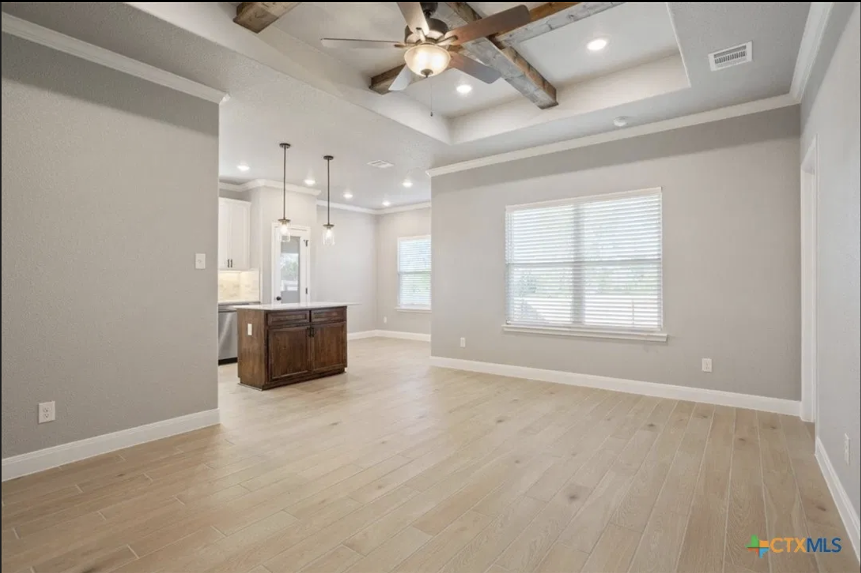 Jerry Wright Homes open-concept living area with ceramic tile