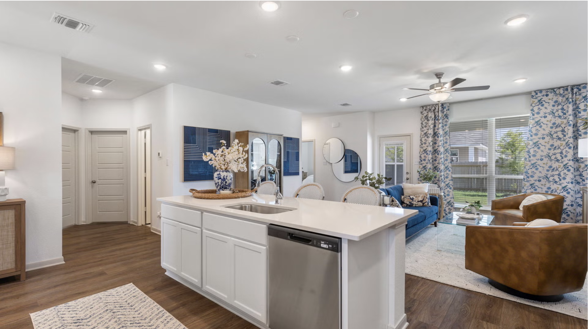 Stylecraft Builders open concept living area at The Homestead — modern finishes, natural light