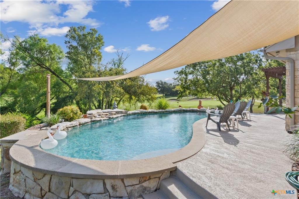 Backyard pool at a Mill Creek custom home