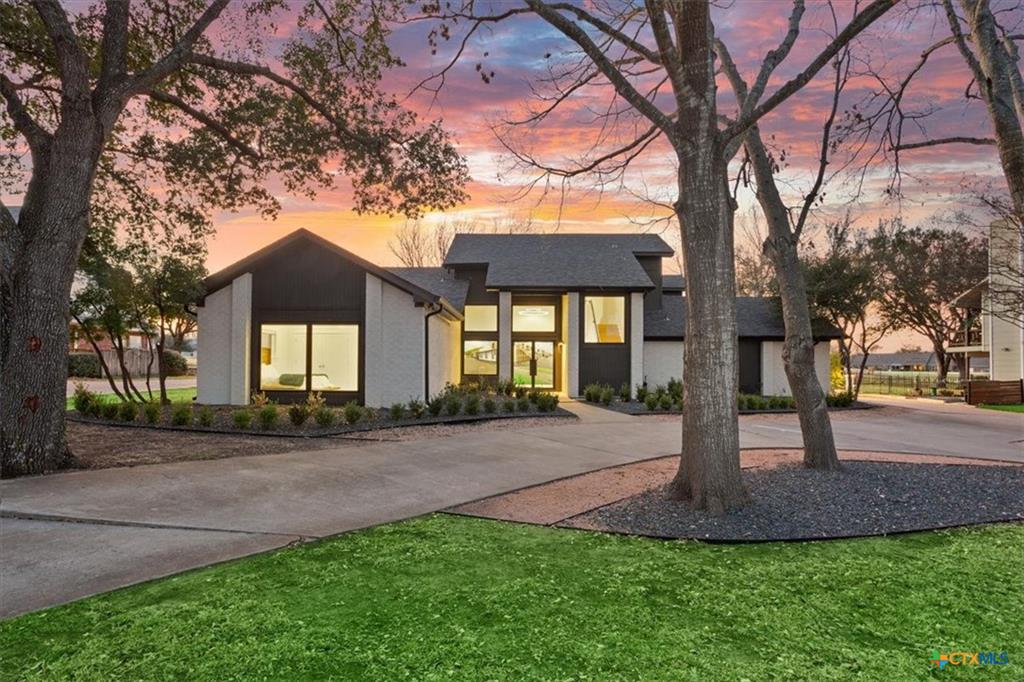 Mill Creek Salado custom home exterior at twilight