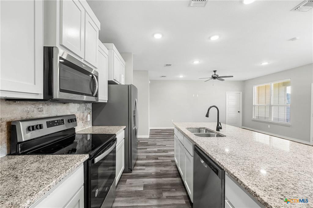 7713 Purvis kitchen — updated appliances, storage, functional layout