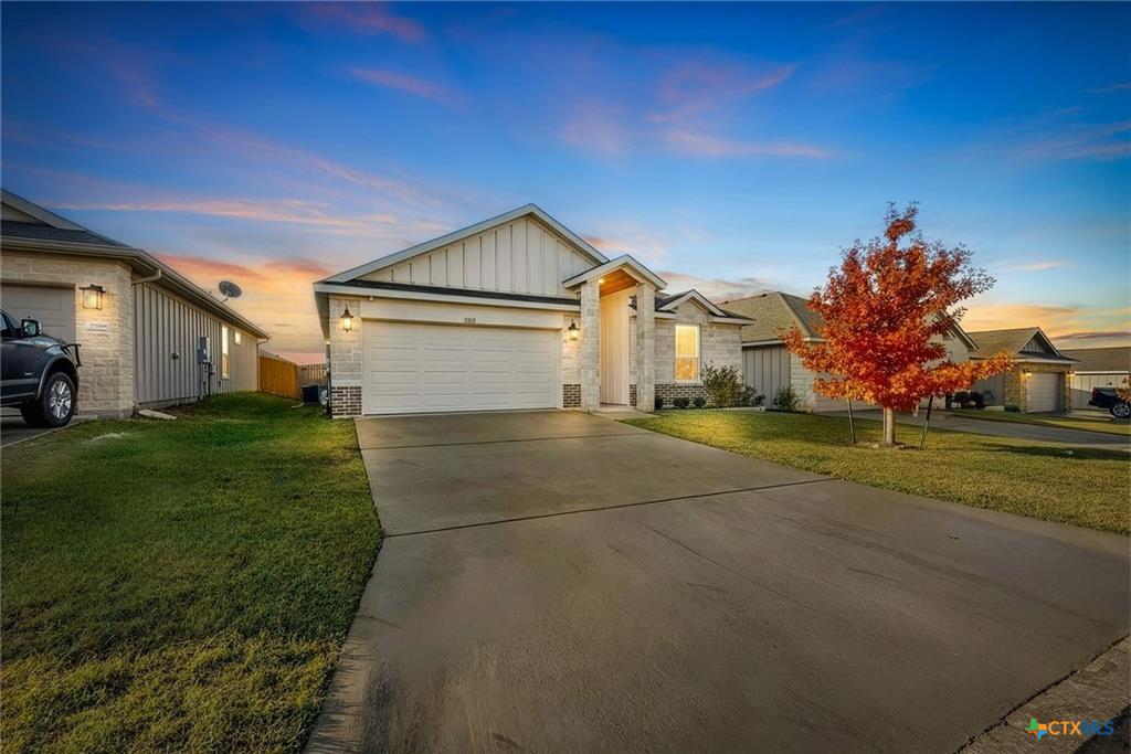 7713 Purvis Street twilight exterior — Reserve at Pea Ridge subdivision, West Temple TX