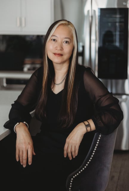 AA-black dress sitting in chair (1)