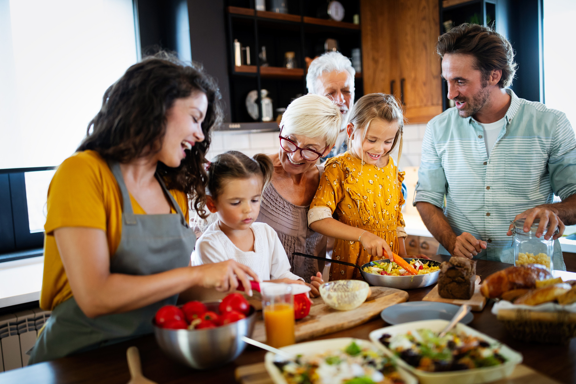 family cooking together kitchen